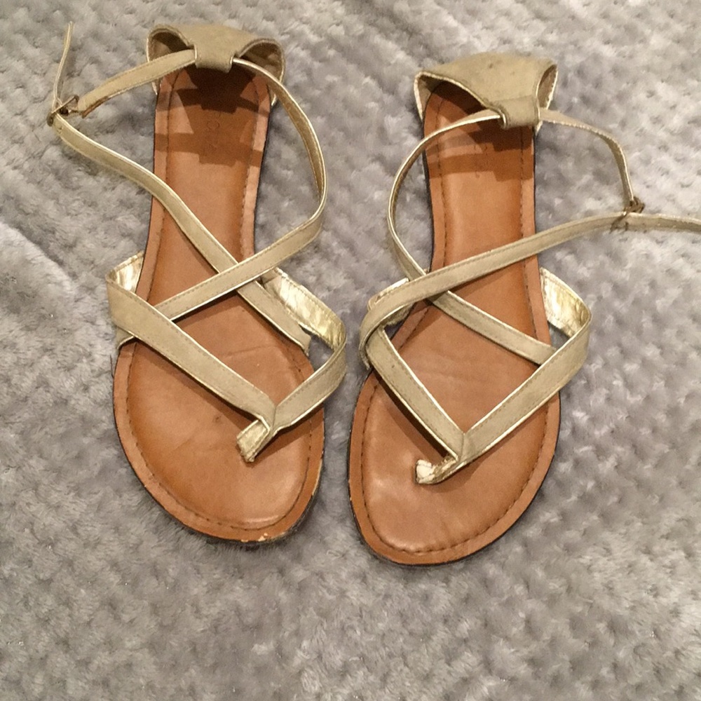 Tan and gold sandals